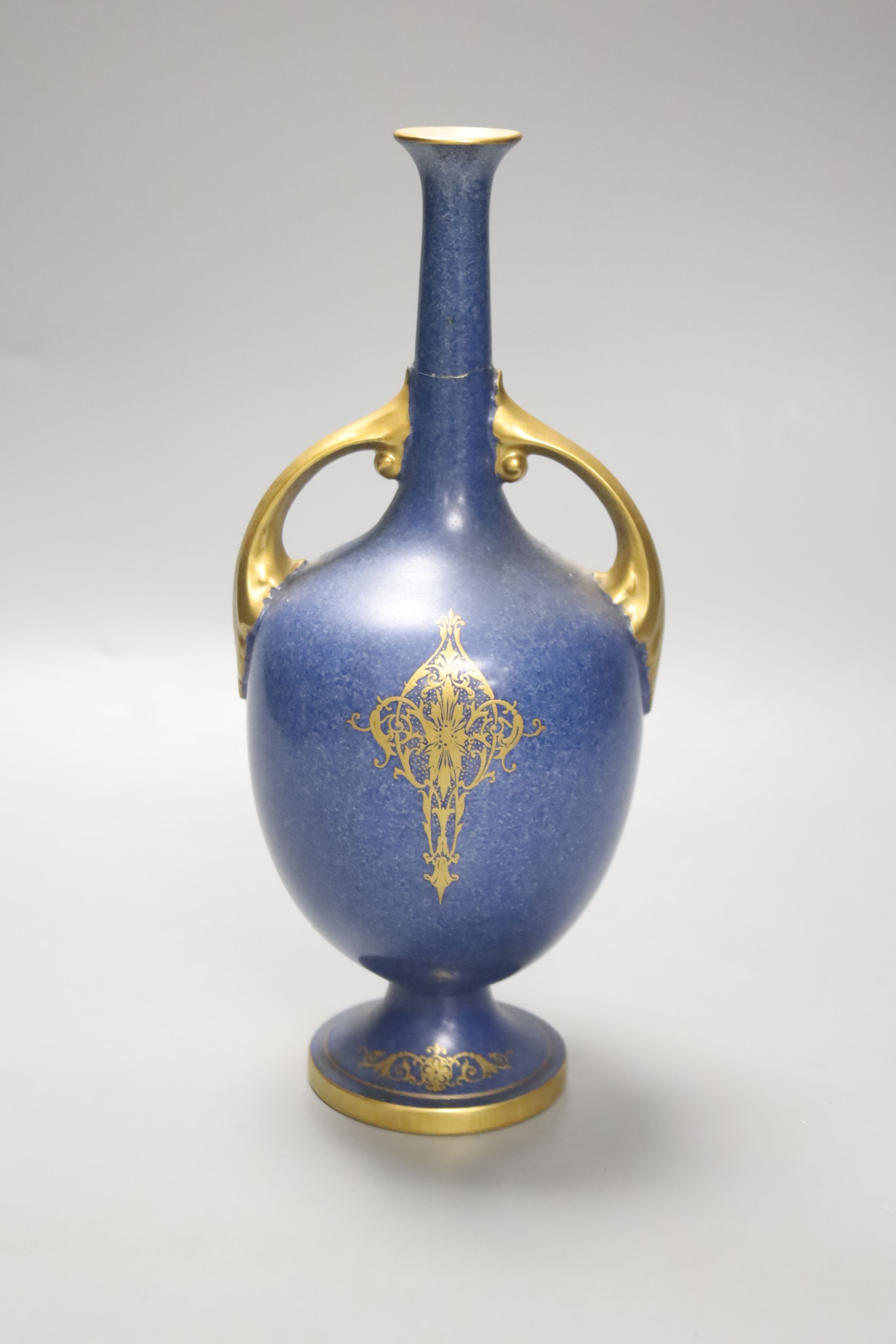 A Royal Worcester two handled blue ground vase, painted with fruit (neck broken and badly re-stuck)